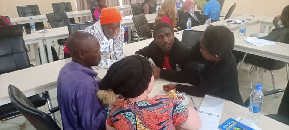 DIF Trainees engage in group discussion in Malawi
